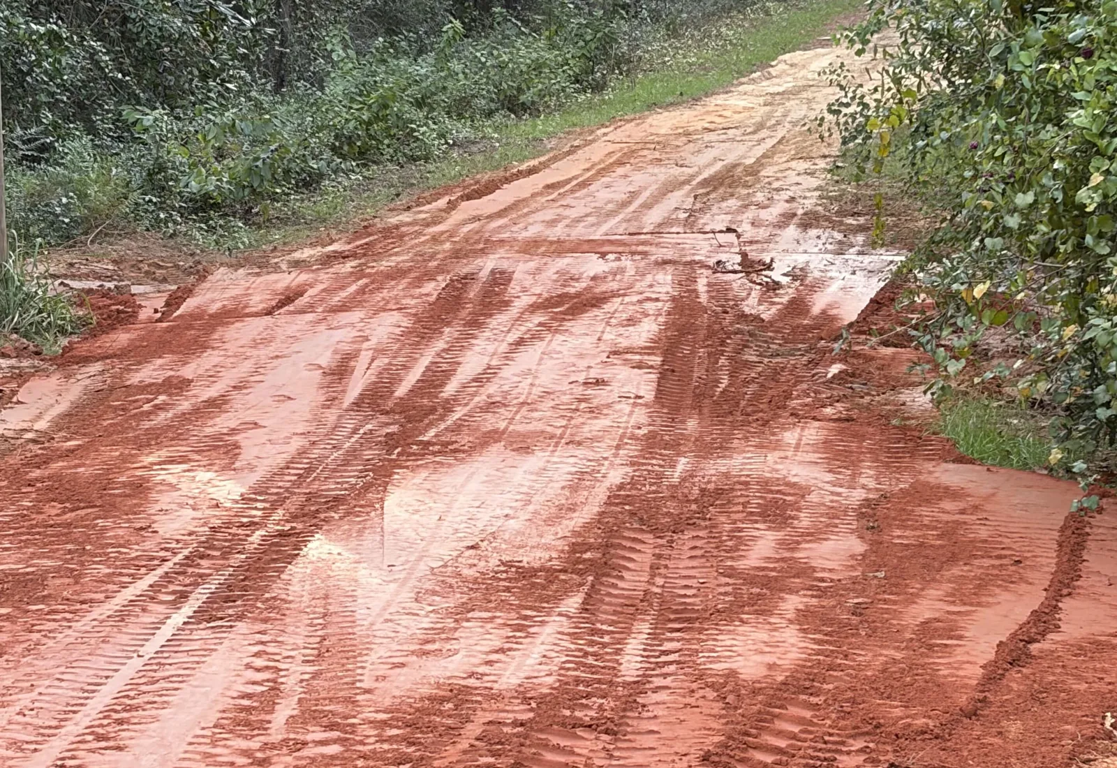 Driveway regraded and packed smooth after a washout repair